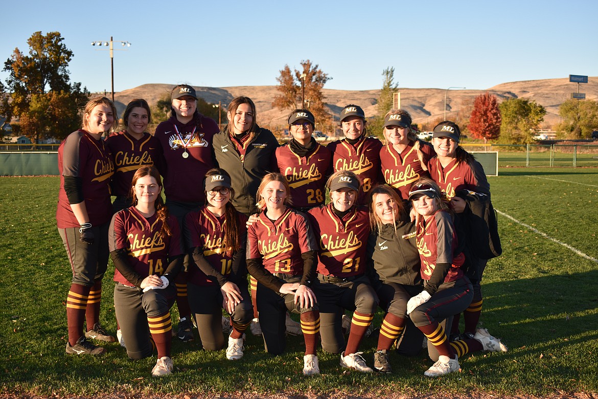Fourteen Lady Chiefs pose for a photo at the state tournament in Yakima on Friday and Saturday.