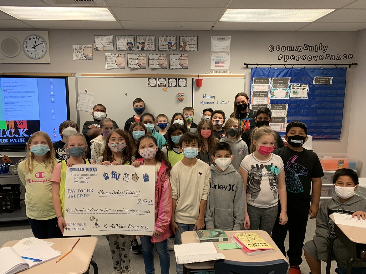 Students in Lindsey Betzing’s class were among the top earners in a benefit penny drive, which raised $256.01, at Knolls Vista Elementary School in Moses Lake for the students at Almira Elementary School, which was destroyed by fire Oct. 12.