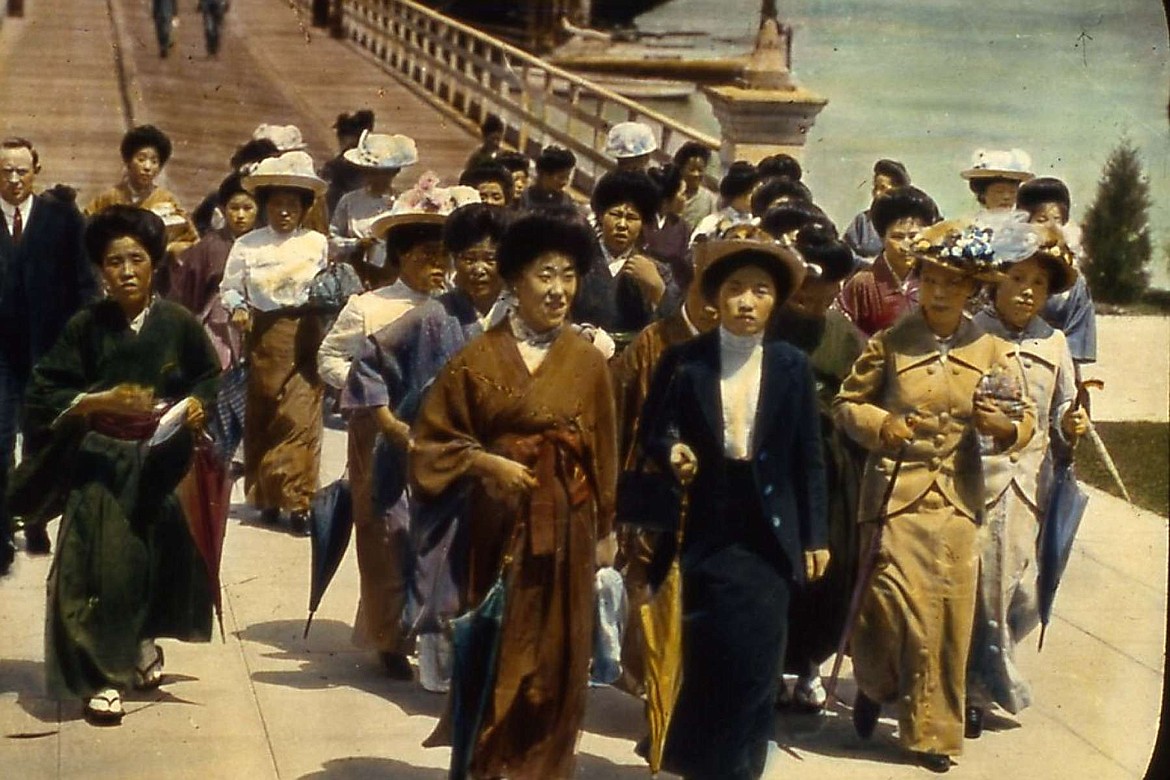 Colorized photo of Japanese “picture bride” immigrants arriving at Angel Island in San Francisco Bay, the facility operating from 1910 to 1940.