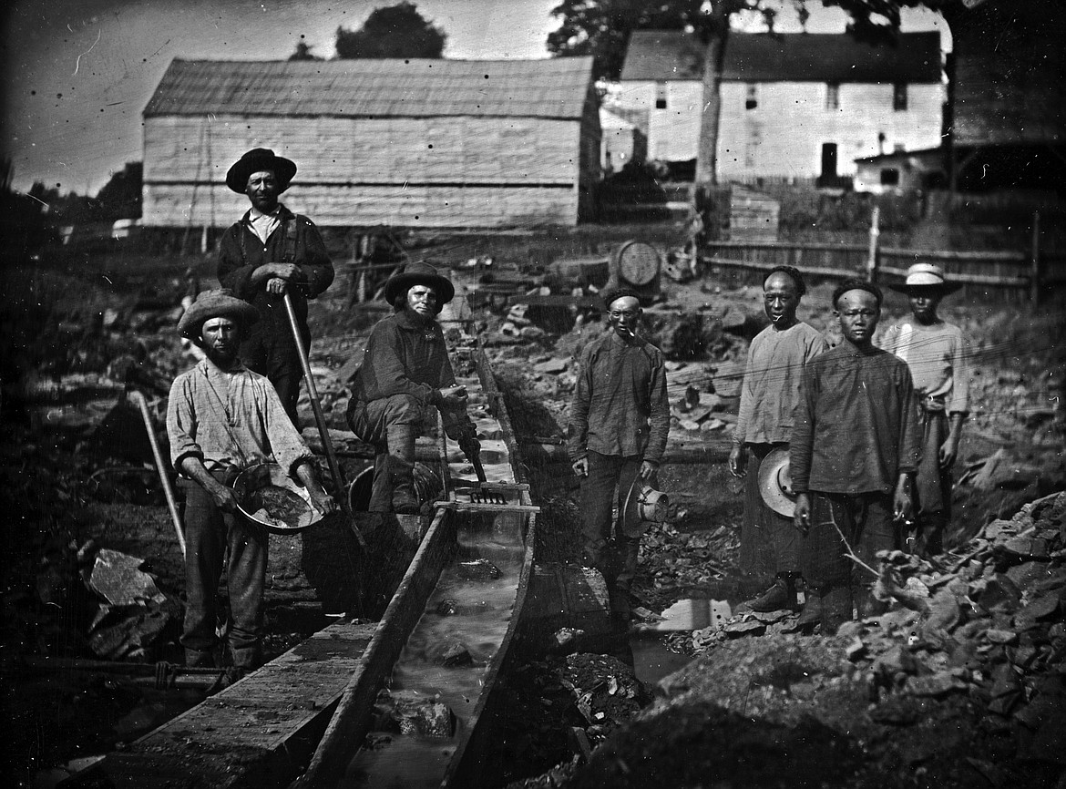 Early Chinese immigrants to the U.S., shown in this photo on right, did well working in mining, building railroads and other occupations but faced discrimination and onerous Asian exclusion laws that didn’t end until 1965.