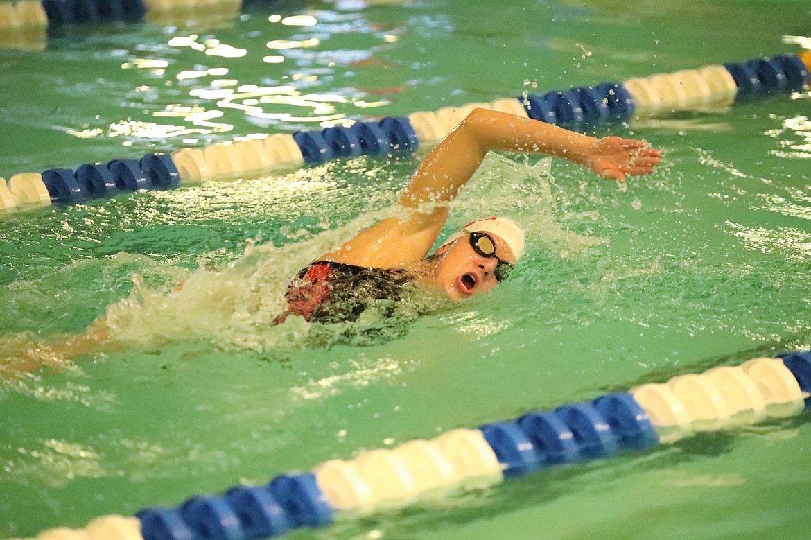 Junior Emily Ballard swims freestyle in the 200 individual medley during the home meet against Skyline on Oct. 8 at the Litehouse YMCA.