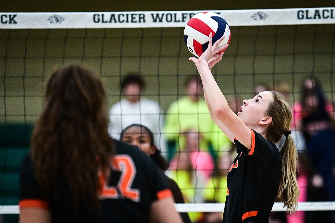 Flathead's Kennedy Moore (9) sets at the net for a teammate against Helena Capital during Round 1 of the Western AA Volleyball Tournament at Glacier High School on Thursday, Nov. 4. (Casey Kreider/Daily Inter Lake)