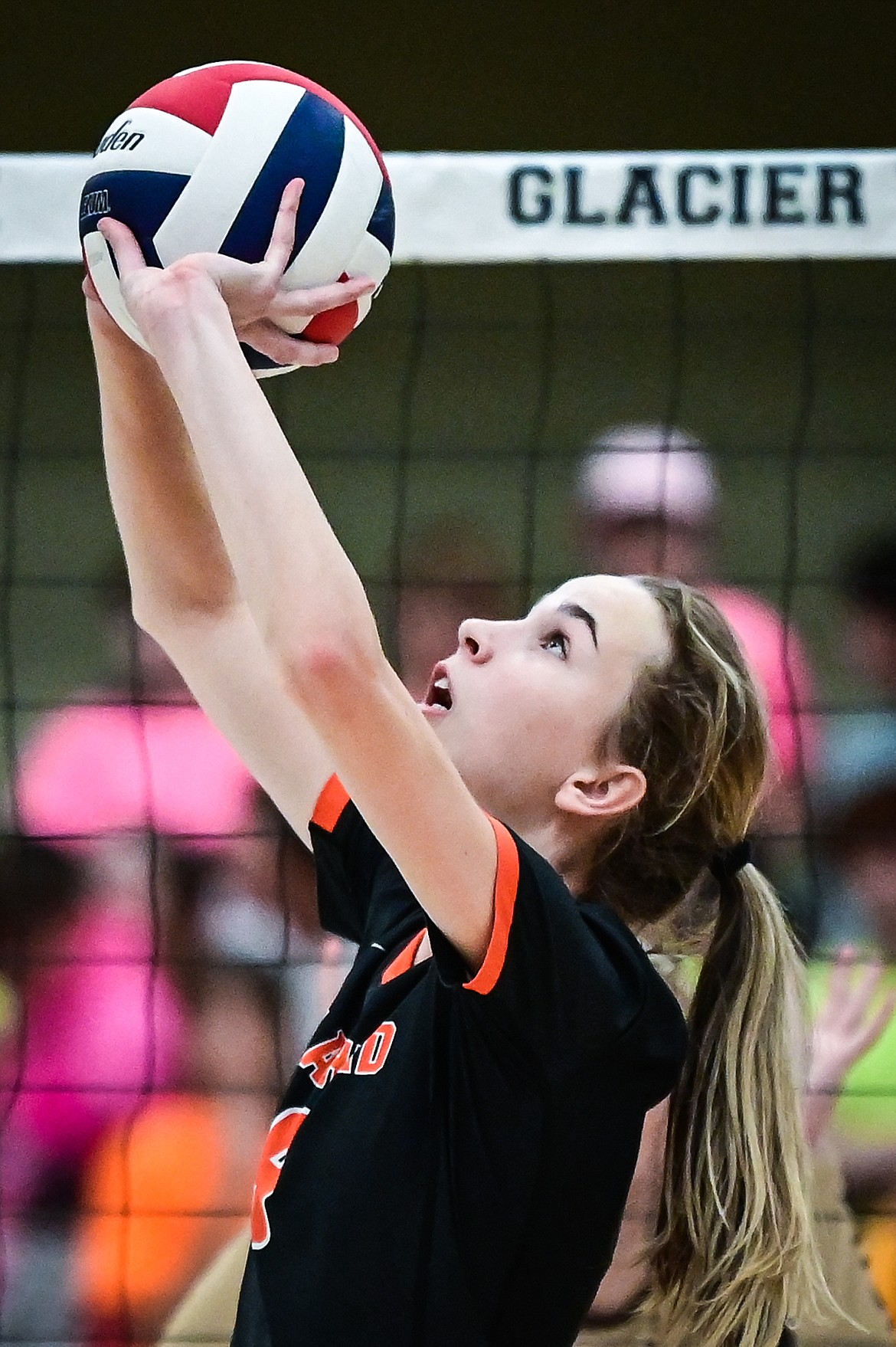 Flathead's Kennedy Moore (9) sets at the net for a teammate against Helena Capital during Round 1 of the Western AA Volleyball Tournament at Glacier High School on Thursday, Nov. 4. (Casey Kreider/Daily Inter Lake)