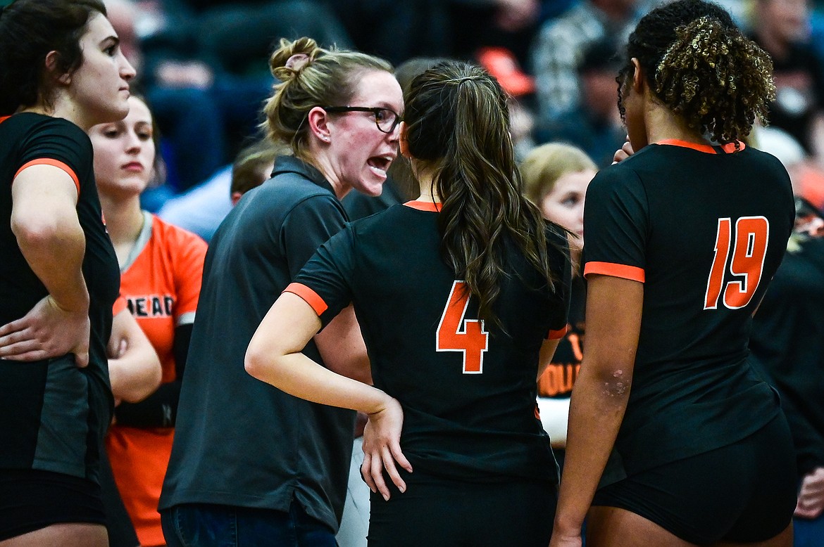 Flathead head coach Emily Russell talks to the Bravettes during a timeout against Helena Capital during Round 1 of the Western AA Volleyball Tournament at Glacier High School on Thursday, Nov. 4. (Casey Kreider/Daily Inter Lake)