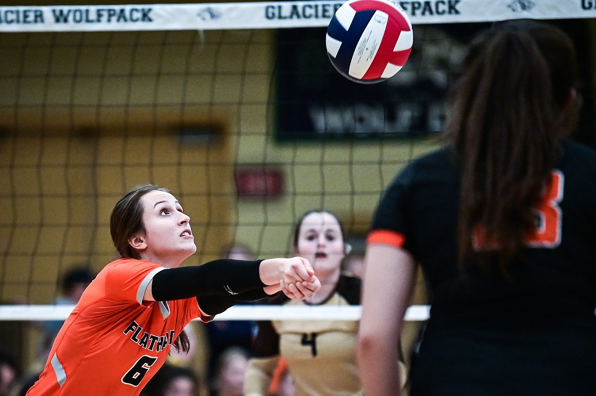 Flathead's Cyan Mooney (6) bumps at the net against Helena Capital during Round 1 of the Western AA Volleyball Tournament at Glacier High School on Thursday, Nov. 4. (Casey Kreider/Daily Inter Lake)