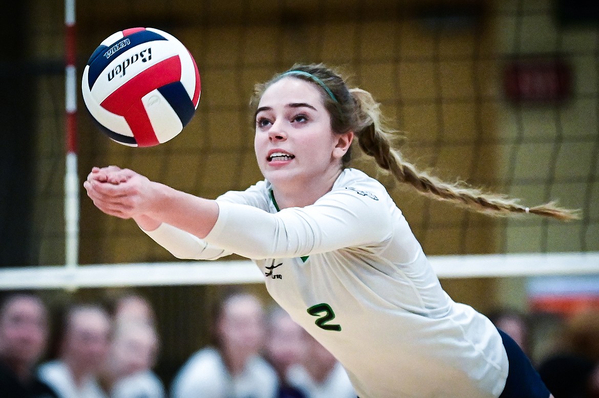 Glacier's Sidney Gulick (2) reaches for a ball against Butte during Round 1 of the Western AA Volleyball Tournament at Glacier High School on Thursday, Nov. 4. (Casey Kreider/Daily Inter Lake)