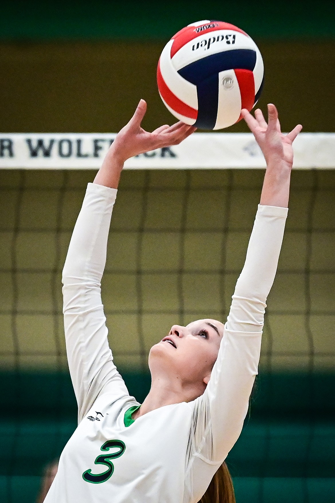 Glacier's Haven Speer (3) sets for a teammate against Butte during Round 1 of the Western AA Volleyball Tournament at Glacier High School on Thursday, Nov. 4. (Casey Kreider/Daily Inter Lake)