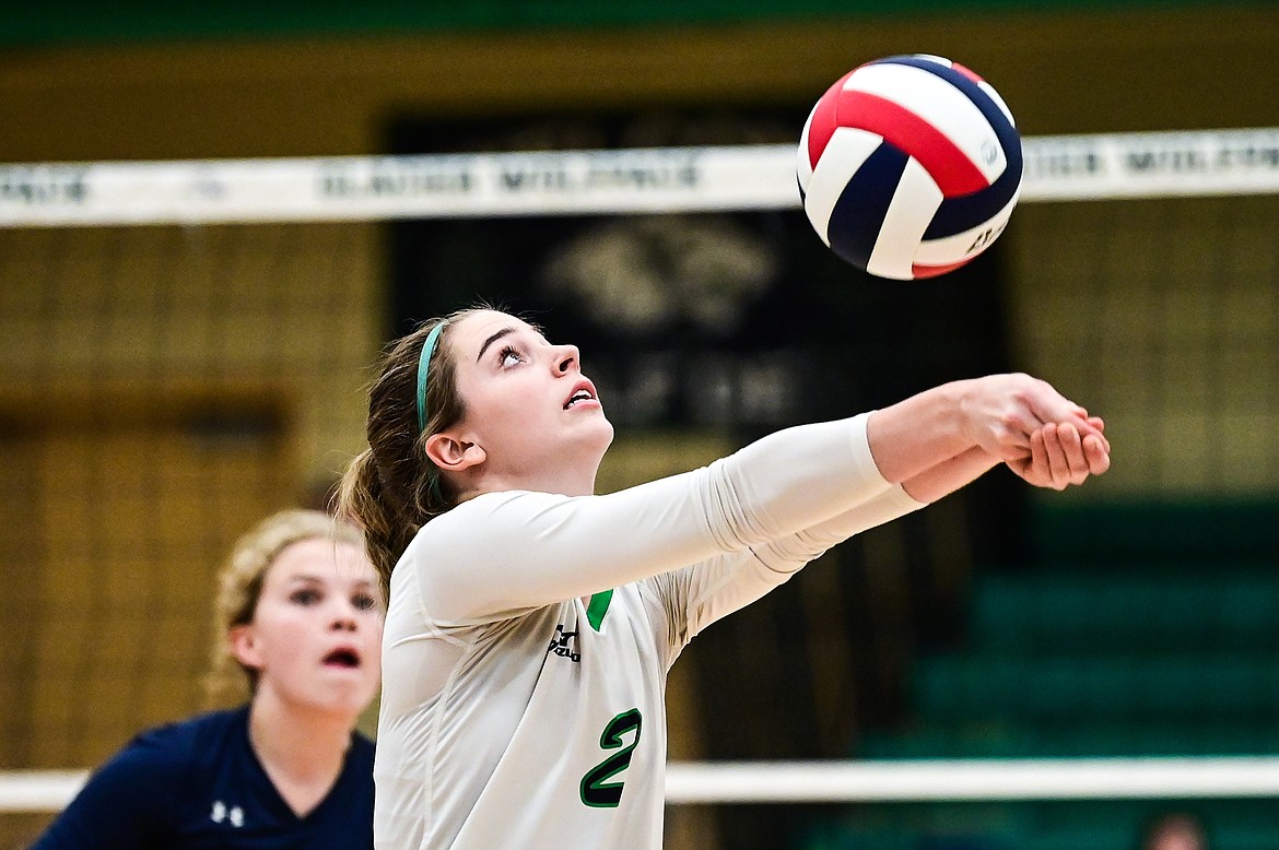 Glacier's Sidney Gulick (2) bumps against Butte during Round 1 of the Western AA Volleyball Tournament at Glacier High School on Thursday, Nov. 4. (Casey Kreider/Daily Inter Lake)