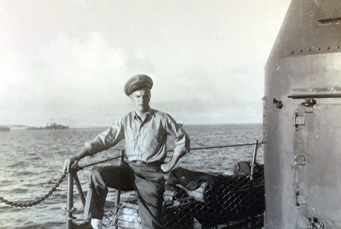 Arnold Peterson poses for a quick photo aboard the destroyer U.S.S. Healy during his time in the Pacific theatre during World War II. (photo provided)