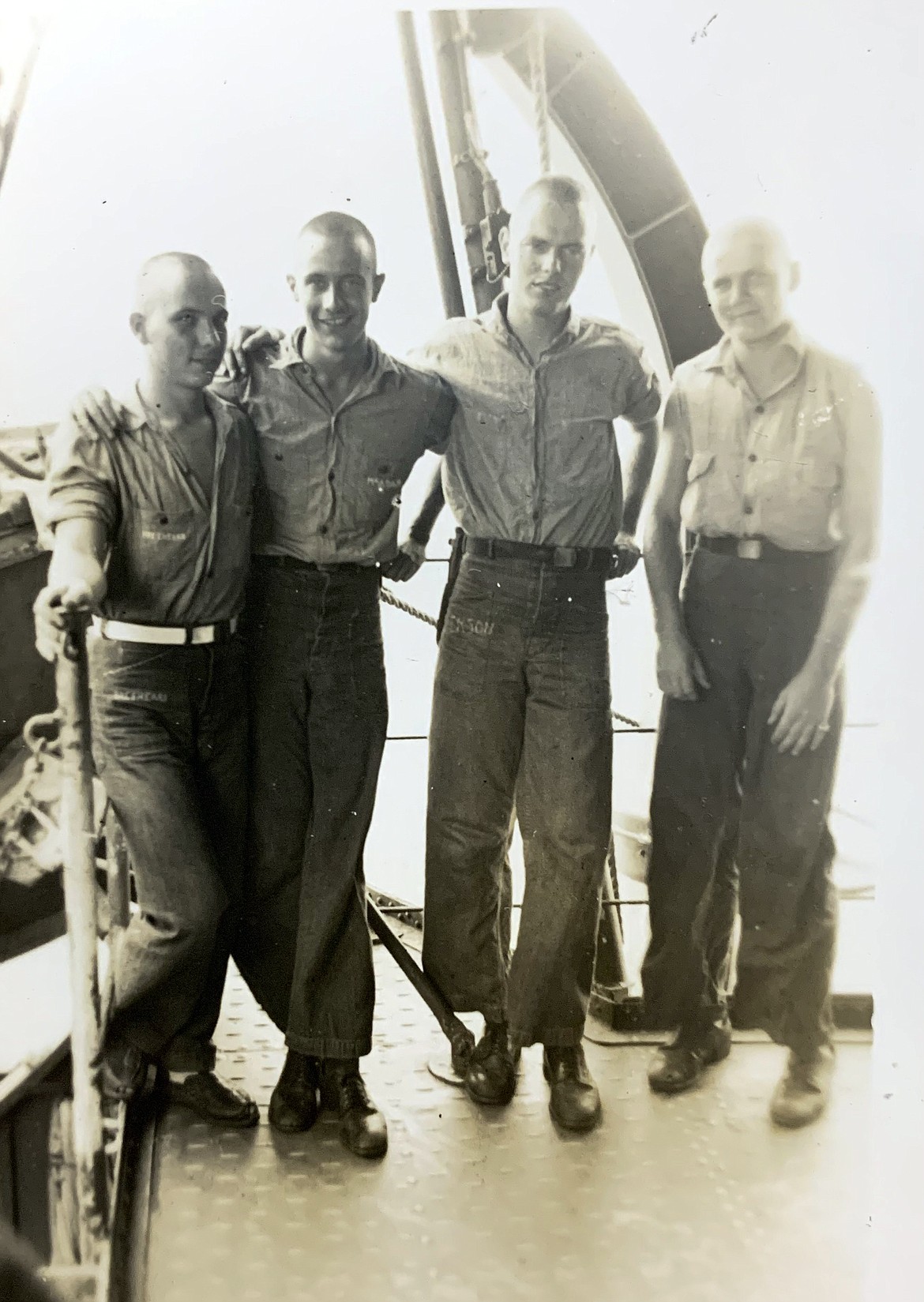 Arnold Peterson (third from left) and his shipmates grab a quick photo as they cross the equator southwest of Hawaii in 1944. (photo provided)