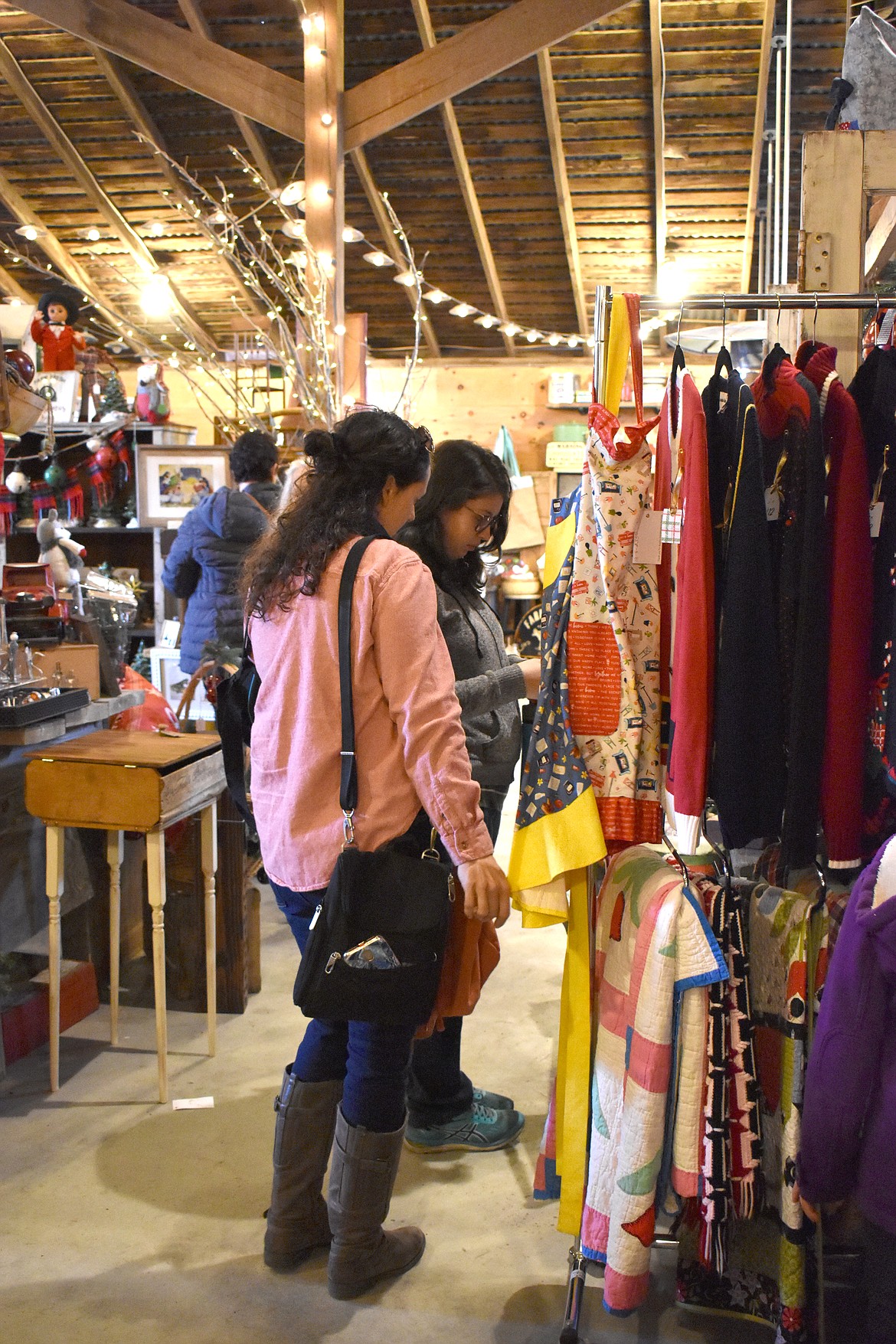 Christina Cooper, and her daughter-in-law Ivory Cooper, shop at the Piper Barn Show on Thursday.