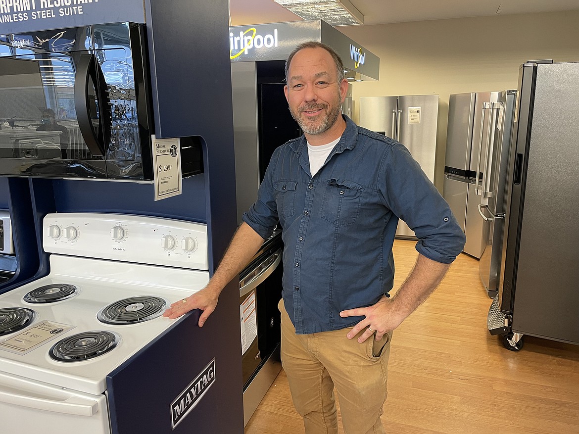 Matt Moore, one of the owners of Moore Furniture, stands in the appliance section of his family’s Ephrata store. Moore said supply problems have gotten so bad he is having to cannibalize floor models to make repairs on customers’ purchases.