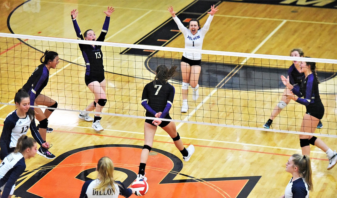 Polson players celebrate after completing a sweep of Dillon on Thursday at Ronan. (Scot Heisel/Lake County Leader)