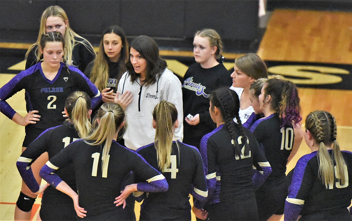 Polson head coach Lizzy Cox talks with her players during the Western A district tournament at Ronan. (Scot Heisel/Lake County Leader)