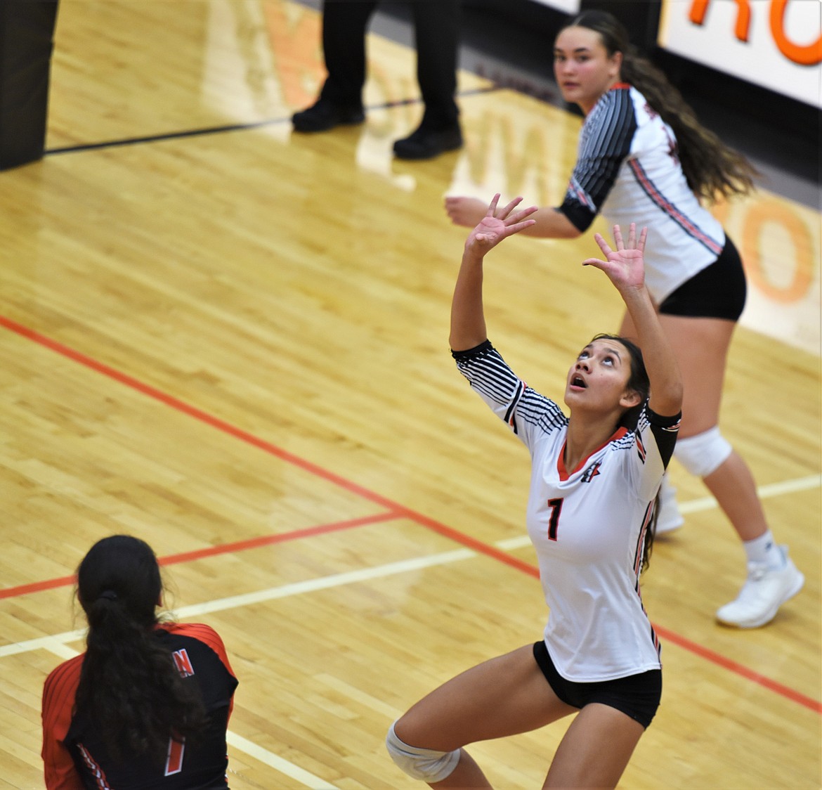 Ronan senior Leina Ulutoa prepares a set shot against Stevensville beside teammates Margaret Cordova (7) and Kylie Fetui. (Scot Heisel/Lake County Leader)