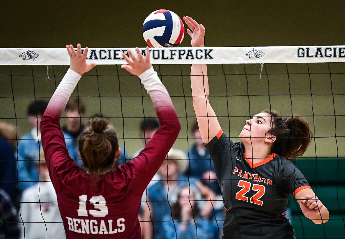 Flathead's Sienna Sterck (22) goes for a kill against Helena in Round 2 of the Western AA Volleyball Tournament at Glacier High School on Friday, Nov. 5. (Casey Kreider/Daily Inter Lake)