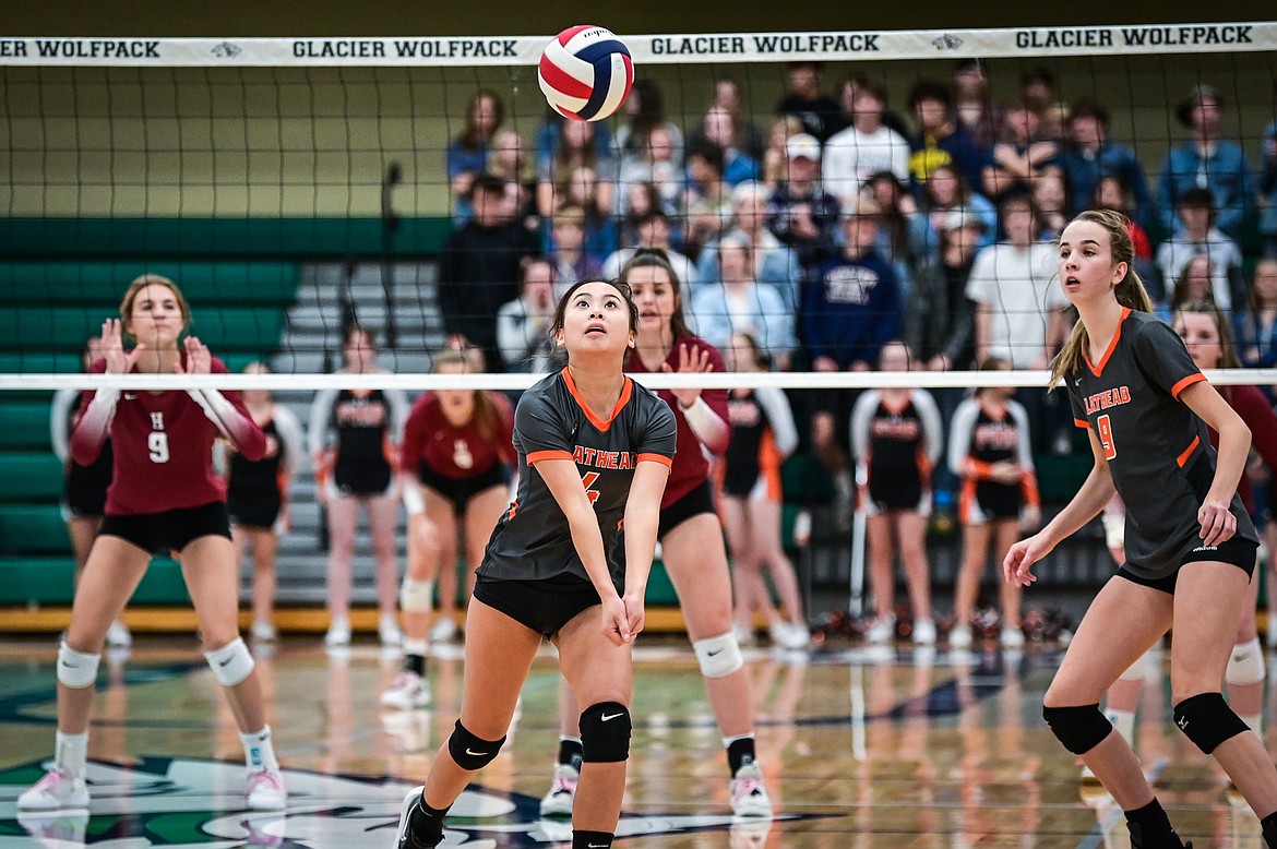 Flathead's Kylie Munsinger (4) drops back for a bump against Helena in Round 2 of the Western AA Volleyball Tournament at Glacier High School on Friday, Nov. 5. (Casey Kreider/Daily Inter Lake)