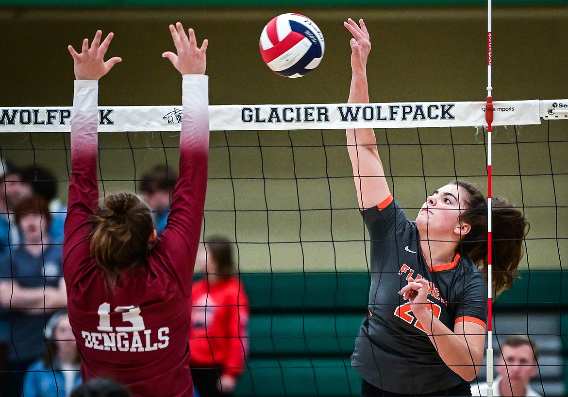 Flathead's Sienna Sterck (22) goes for a kill against Helena in Round 2 of the Western AA Volleyball Tournament at Glacier High School on Friday, Nov. 5. (Casey Kreider/Daily Inter Lake)