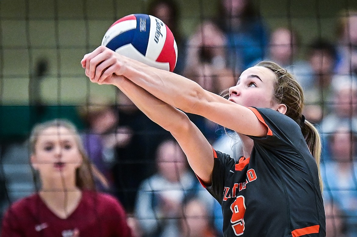 Flathead's Kennedy Moore (9) bumps at the net against Helena in Round 2 of the Western AA Volleyball Tournament at Glacier High School on Friday, Nov. 5. (Casey Kreider/Daily Inter Lake)