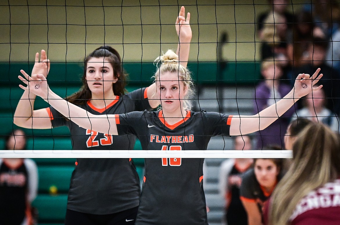 Flathead's Savanna Sterck (23) and Maddy Moy (18) await a serve from Helena in Round 2 of the Western AA Volleyball Tournament at Glacier High School on Friday, Nov. 5. (Casey Kreider/Daily Inter Lake)