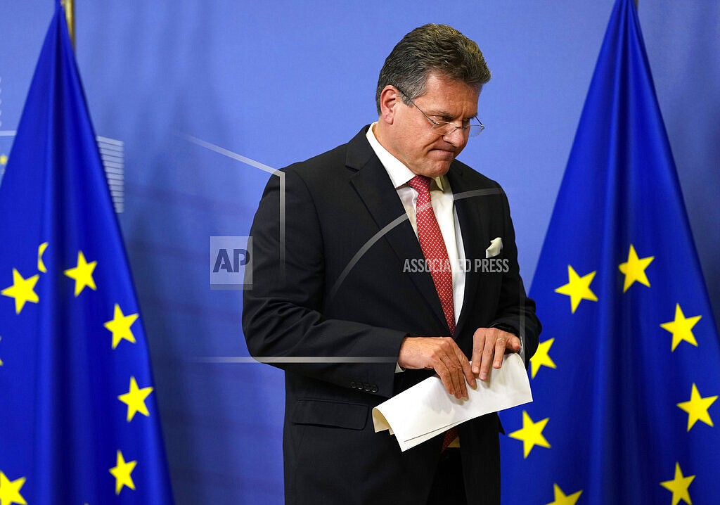 European Commissioner for Inter-institutional Relations and Foresight Maros Sefcovic leaves the podium after speaking during a media conference at EU headquarters in Brussels, Friday, Nov. 5, 2021. The UK's chief Brexit negotiator David Frost met his EU counterpart Maros Sefcovic on Friday to discuss outstanding issues regarding trade in Northern Ireland. A fishing row between Britain and France is further complicating issues between the EU and recently departed Britain. (AP Photo/Virginia Mayo, Pool)