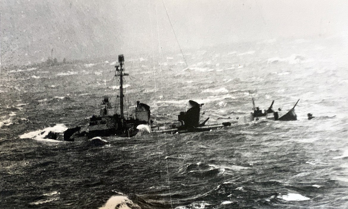 The U.S.S. Healy nearly goes down in rough seas as seen from the U.S.S. Essex. (photo provided)