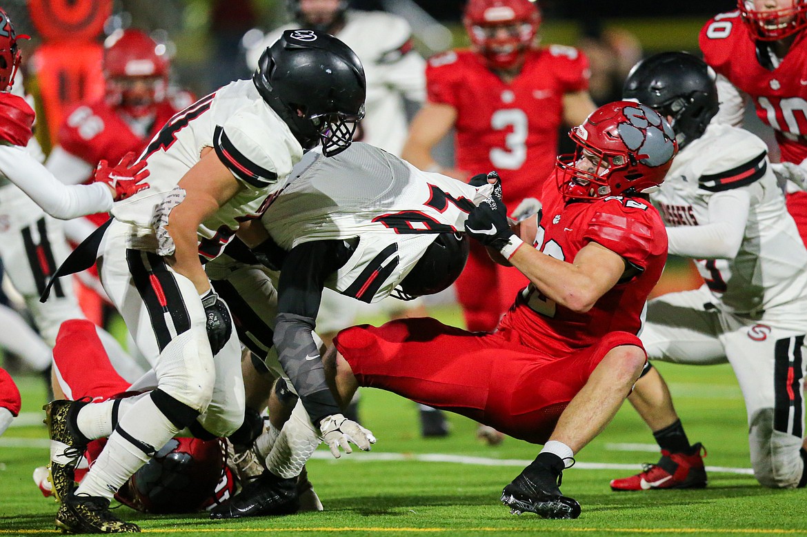 Linebacker Wes Benefield drags down a Shelley player during Friday's 4A state quarterfinal.