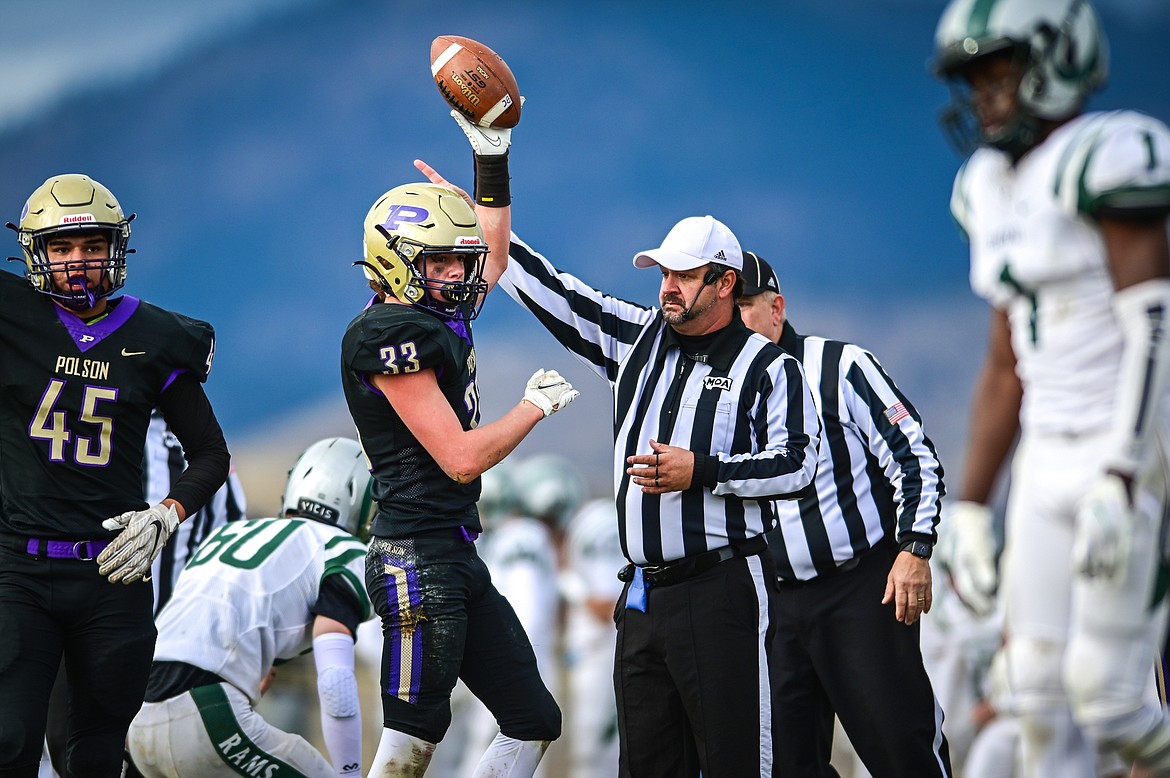 Polson linebacker Keyen Nash (33) holds up the football after recovering a fumble in the third quarter against Billings Central at Polson High School on Saturday, Nov. 6. (Casey Kreider/Daily Inter Lake)