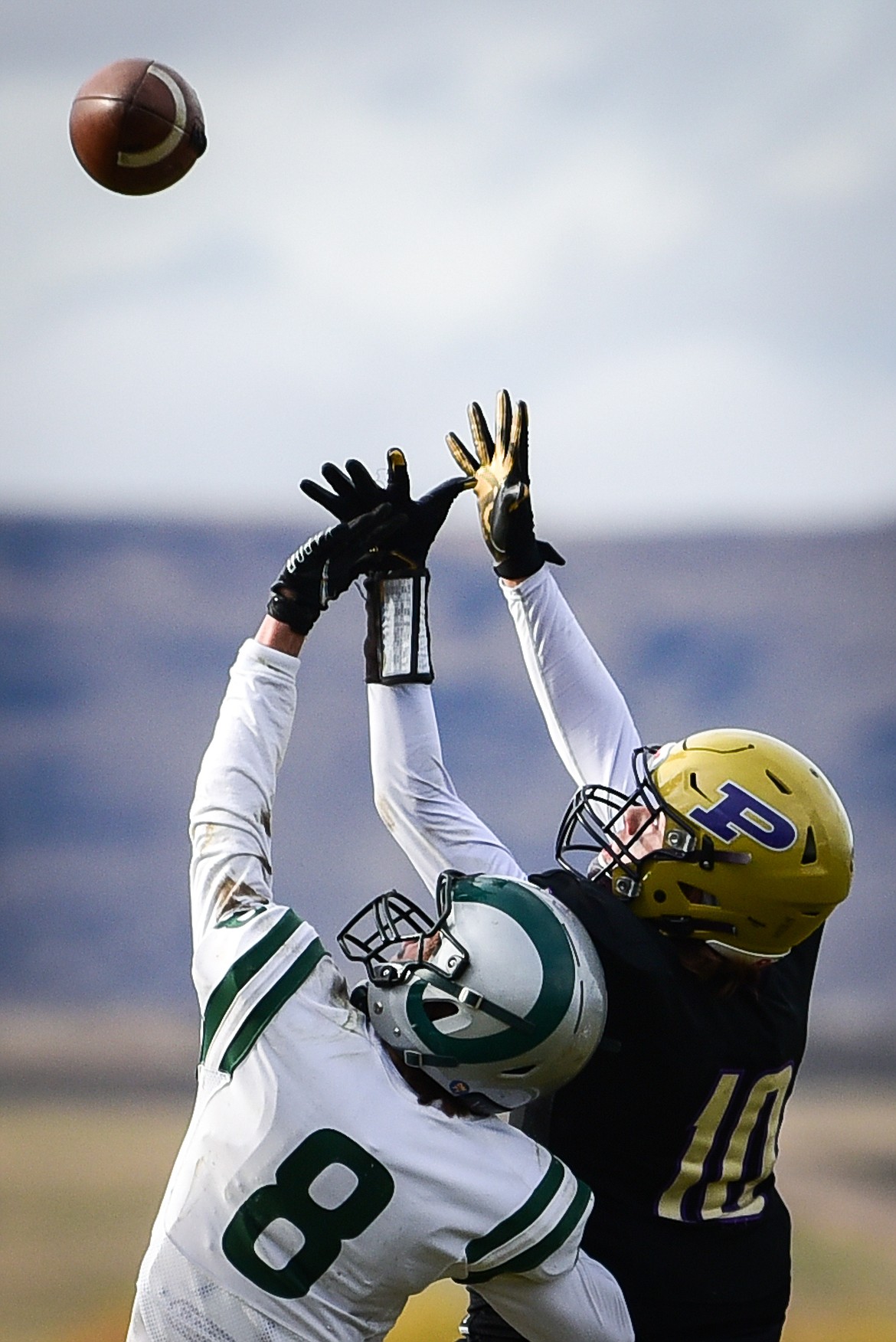 Polson wide receiver Colton Graham (10) catches a touchdown pass in the fourth quarter over Billings Central defender Travis Hadley (8) at Polson High School on Saturday, Nov. 6. (Casey Kreider/Daily Inter Lake)