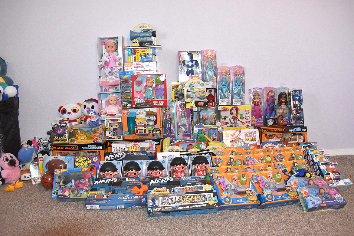 The toys collected, shown here, include Paw Patrol, Nerf toys, Hot Wheels and puzzles among others.