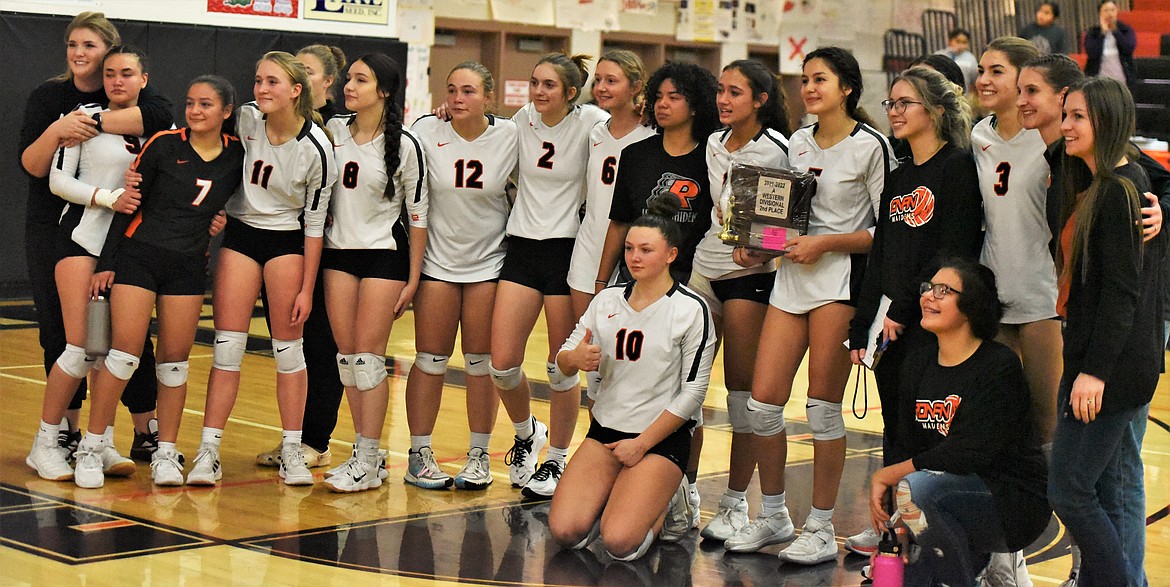 Pictured, from left, are Ronan head coach Lacey Phelan, Kylie Fetui (9), Margaret Cordova (7), Jase Frost (11), manager Dorothy Webster, Julianna Vizzerra (8), Haylie Webster (12), Kenslie Fisher (2), Claire Crist (6), Adri Tatukivei, Rylie Lindquist (10), Leina Ulutoa (1), LaReina Cordova (5, holding plaque), manager LaRhea Webster, Hannah Rowe, Olivia Clairmont (3), Seattle Chartraw (front), and assistant coaches Madison Wassam and Katie Elliott. (Scot Heisel/Lake County Leader)