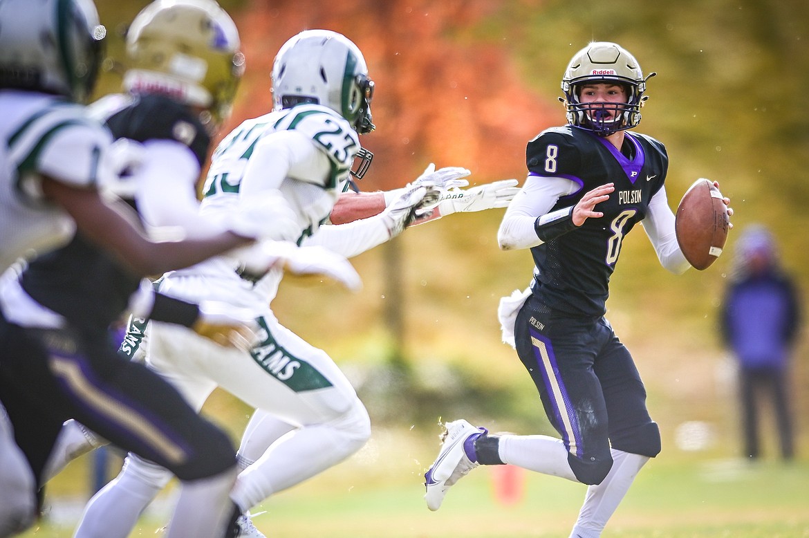 Quarterback Jarrett Wilson looks for an open receiver. (Casey Kreider/Daily Inter Lake)