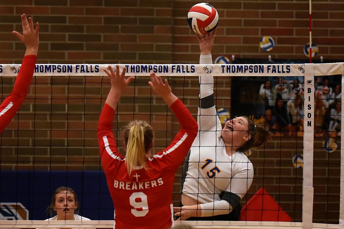 Thompson Falls senior Danni Van Huss delivers a spike against Loyola’s Jamie Janetski during last Thursday’s match in the Western B tournament. (Jeremy Weber/Valley Press)