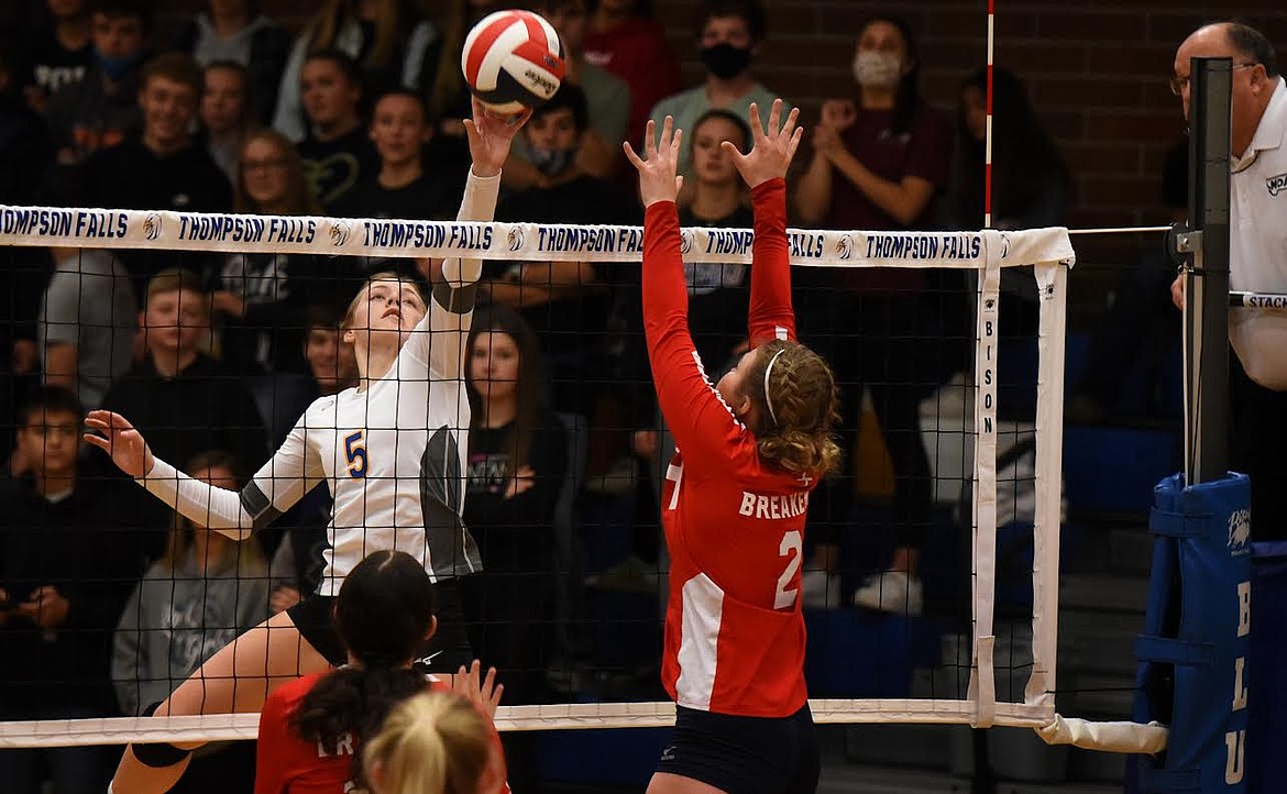 Thompson Falls junior Natalie Roberts tips a shot past Loyola’s Natalie Clevenger during last Thursday’s match in the Western B tournament. (Jeremy Weber/Valley Press)