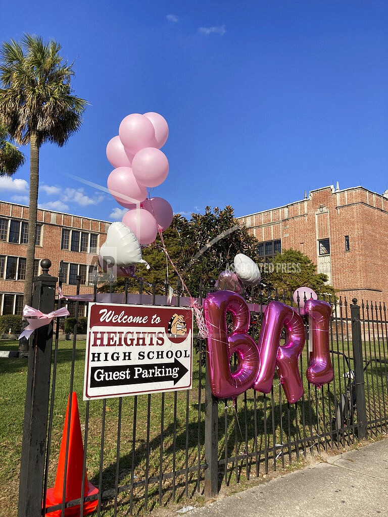 A memorial is seen outside Heights High School, where Brianna Rodriguez attended, Monday, Nov. 8, 2021, in Houston. Rodriguez died from injuries sustained during a stampede at the Astroworld music festival days earlier. (AP Photo/Jamie Stengle)