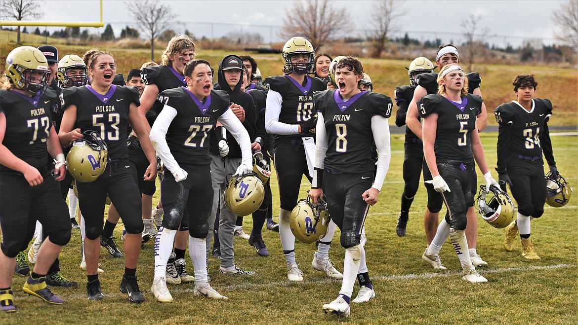 The Pirates celebrate after defeating Billings Central 49-28 in the Class A state quarterfinals Saturday in Polson. (Scot Heisel/Lake County Leader)