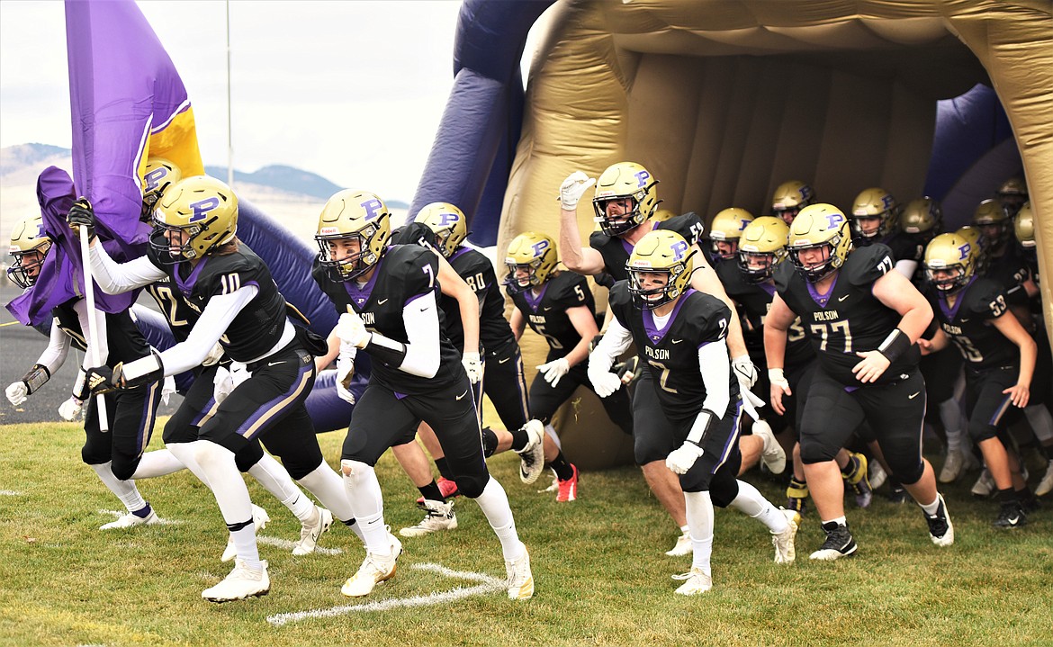 The Pirates take the field prior to their Class A quarterfinal game against Billings Central. (Scot Heisel/Lake County Leader)
