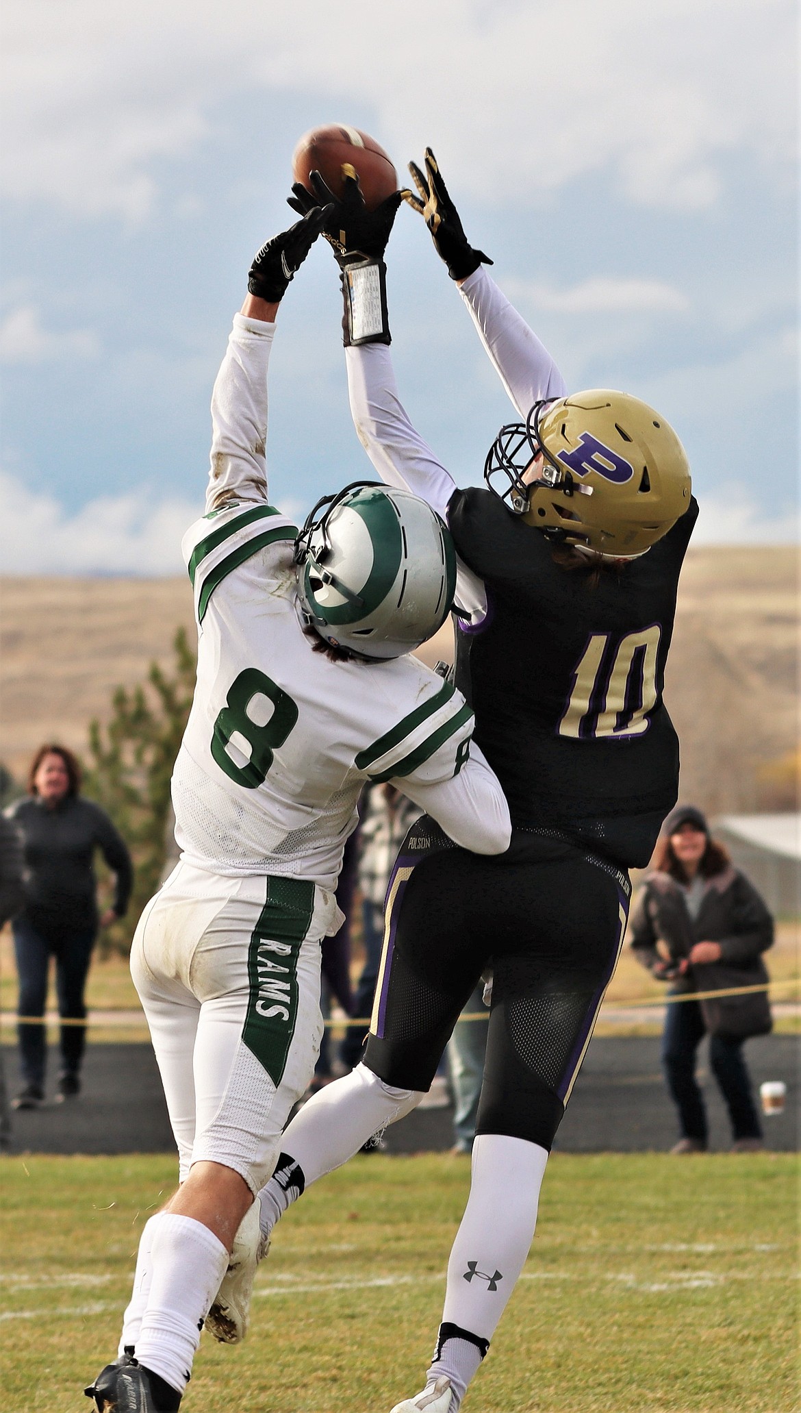 Polson receiver Colton Graham (10) pulls down a touchdown reception over Billings Central defender Travis Hadley. (Courtesy of Niki Graham)