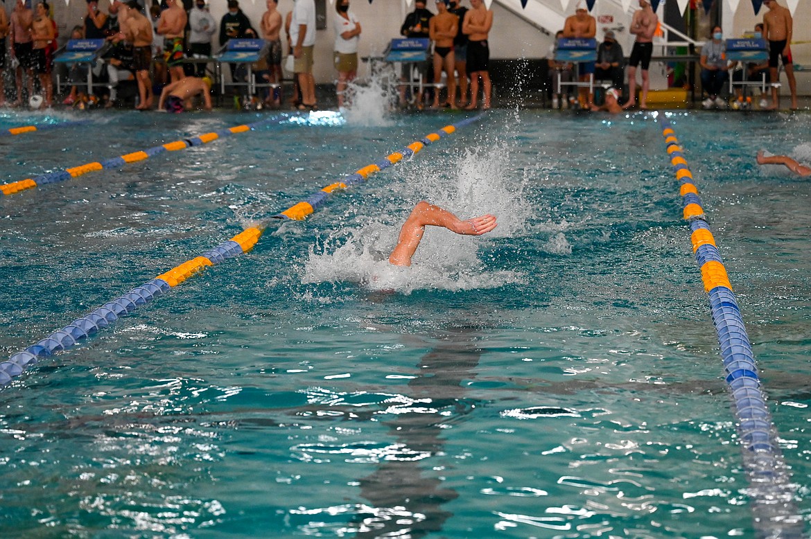Senior Hayden Leavitt swims in prelims on Friday.
