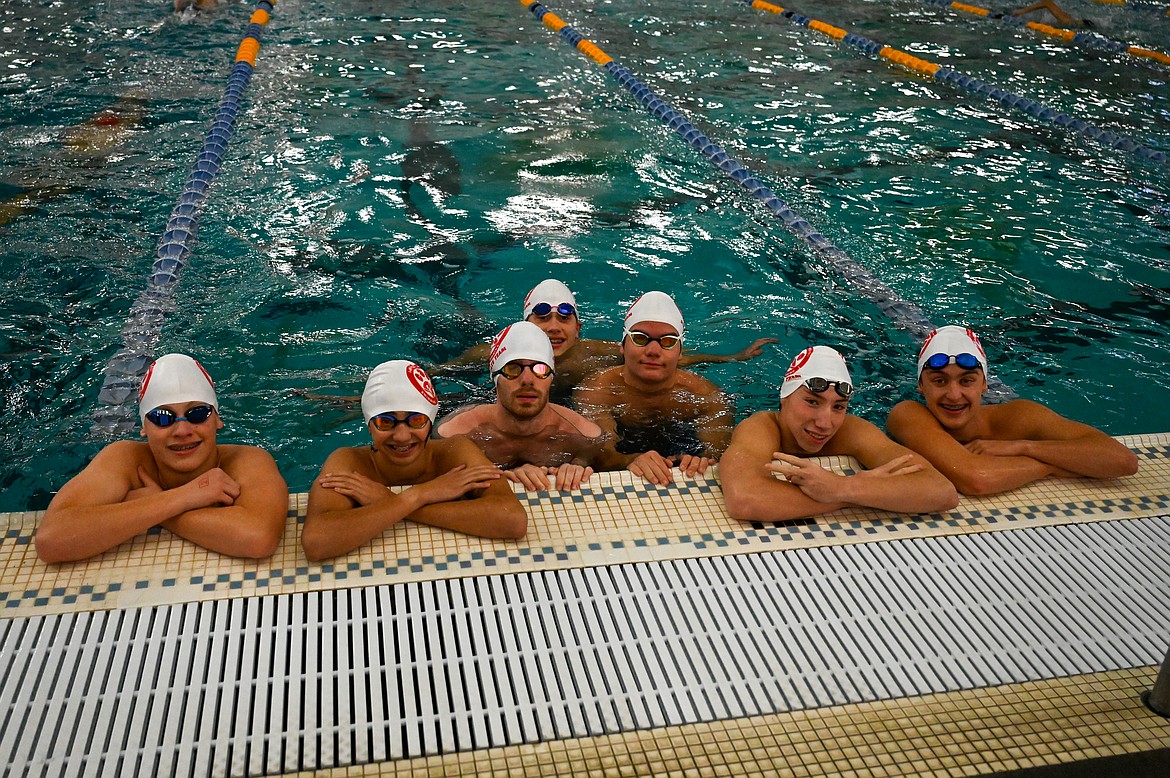 The Sandpoint boys swim team poses for a photo during warm-ups at state.