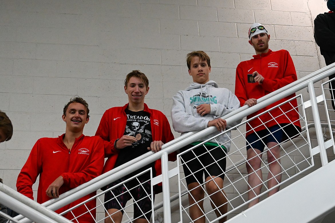 From left: Caleb Norling, Hayden Leavitt, Lon LeBlanc and Jack Grzincic pose for a photo after capturing third in the 200 free relay.