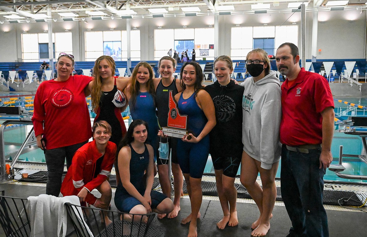 The Sandpoint girls swim team poses for a photo with the runner-up trophy at the 4A state swim meet Saturday.