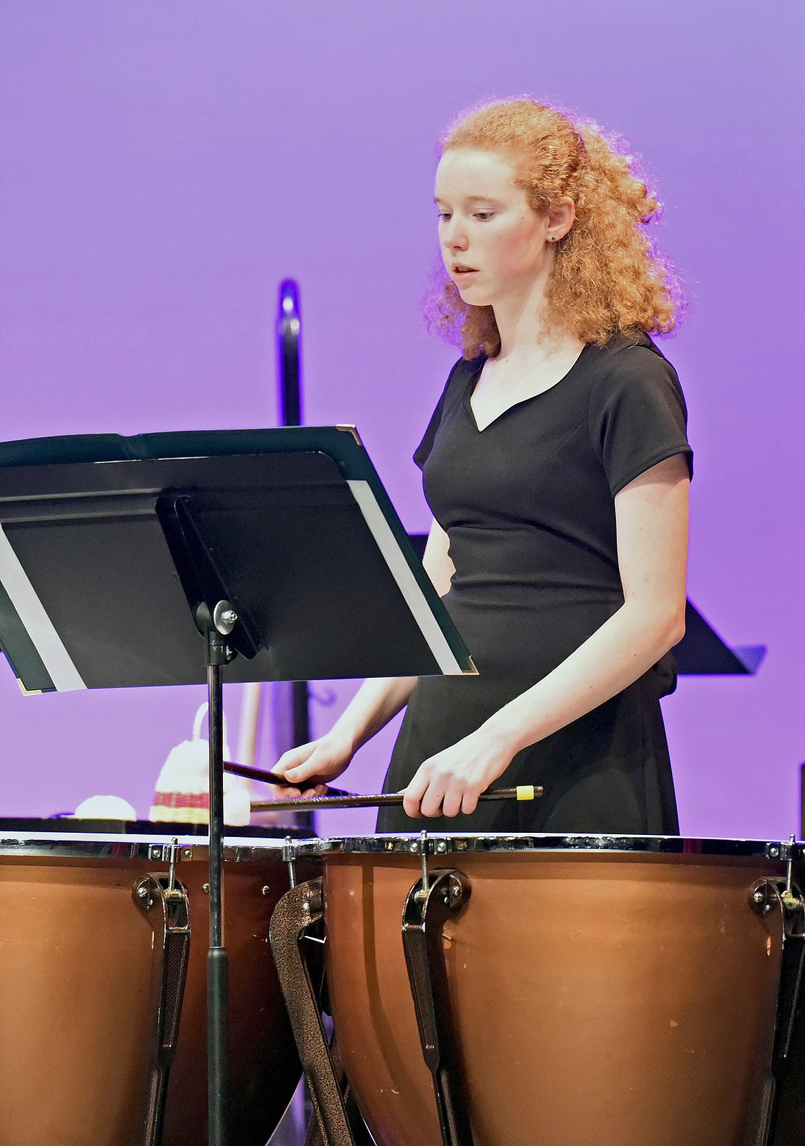 Whitefish High School student Rachel Bowland plays the timpani during the Fall Band Concert on Oct. 28 at the Performing Arts Center in Whitefish. (Whitney England/Whitefish Pilot)