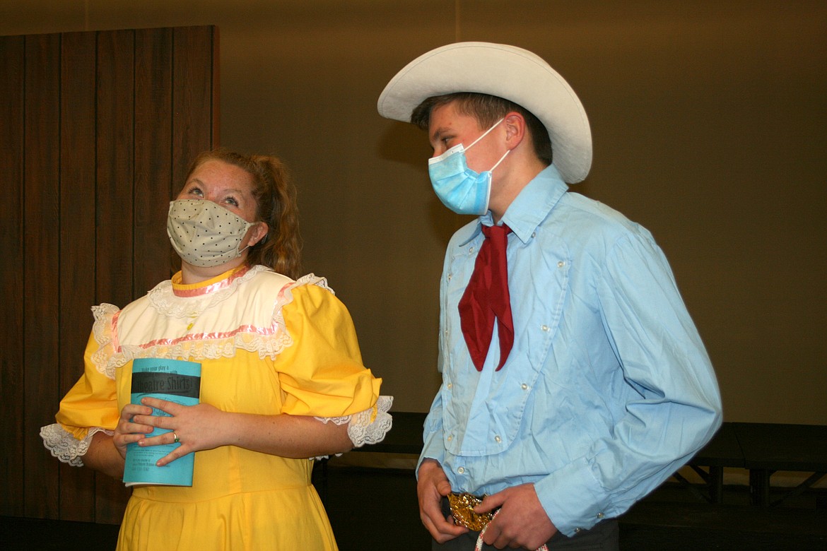 Sunny Day (Madison Giles, left) is smitten by Johnny Lasso (Dallin Freeman) in the Othello High School Drama Club production of “Shakespeare Goes to Gravel Gulch.”