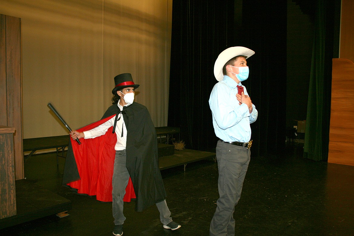The villainous Noble Heart (Adrian Mendoza, left) prepares an attack on hero Johnny Lasso (Dallin Freeman) in the Othello High School Drama Club production of “Shakespeare Goes to Gravel Gulch.”