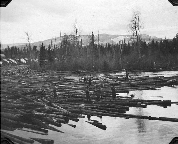 1915 Log Drive Down Swan River with “River Pigs”. Attribution: US Forest Service - Northern Region Archives