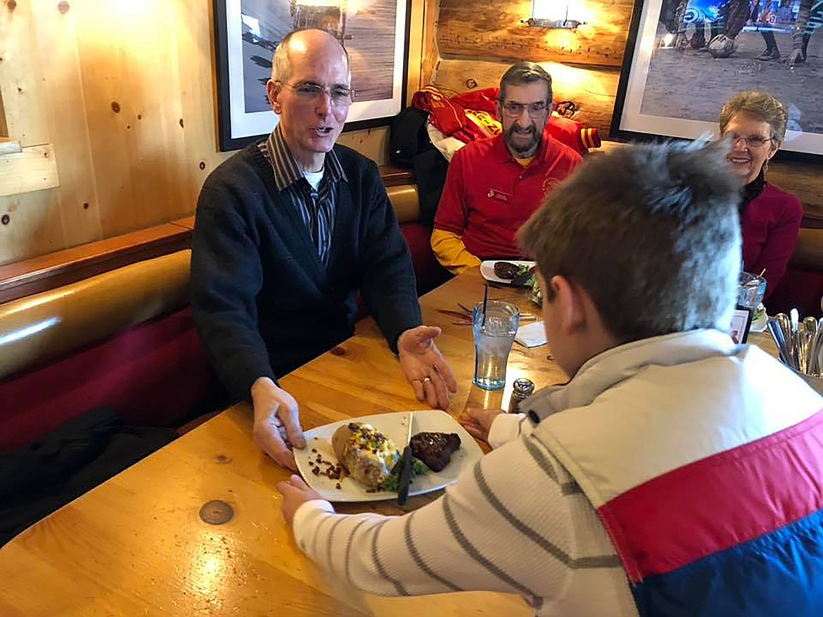 Lou Foust, son of Chad and Meggie Foust, serves a veteran at a past Veterans Day event. The youngster is the inspiration for his parents’ restaurants, Sweet Lou’s Restaurant and Bar in Ponderay and Sweet Lou’s Restaurant and Tap House in Coeur d’Alene.