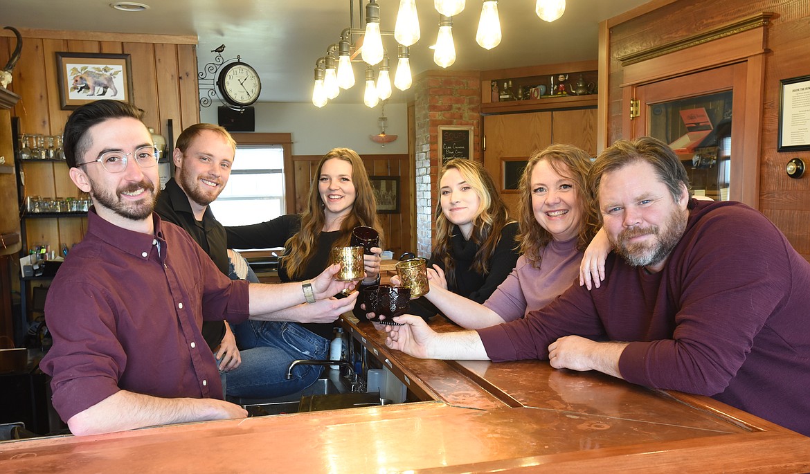 The crew of Whitefish Handcrafted Spirits, counterclockwise, are Clint 
Courtney, Matt Sefcak, Jasmyn Stratton, Rebecca Hafferman, Danette Sefcak and Tom Sefcak. (Scott Shindledecker/Daily Inter Lake)