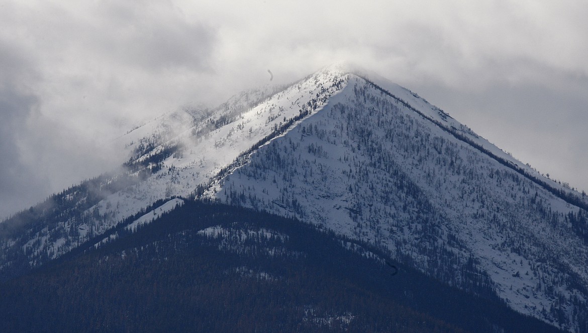 The snowcapped Cabinet Mountains tower over the lush Kootenai River Valley outside of Libby. (AP FILE)