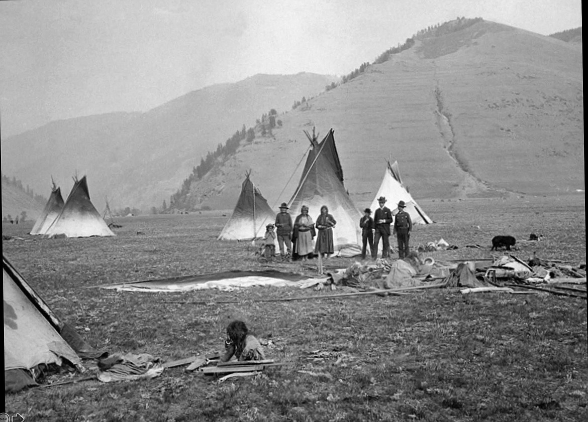 Photo taken in 1880 of Salish Indians and tepees at the base of Missoula's present day "M" mountain